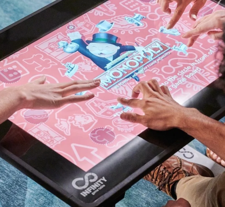 Arcade1Up Infinity Game Table features a highresolution touchscreen
